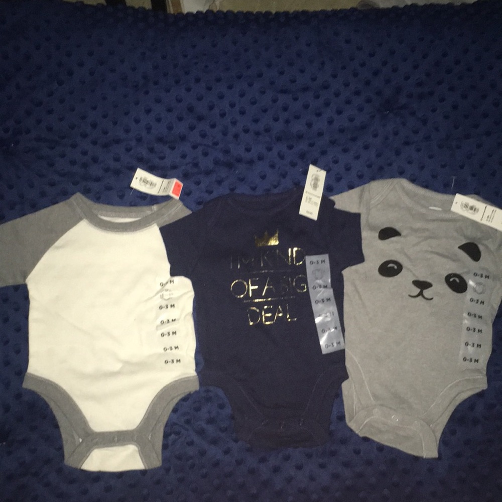 Three unisex Old Navy bodysuits